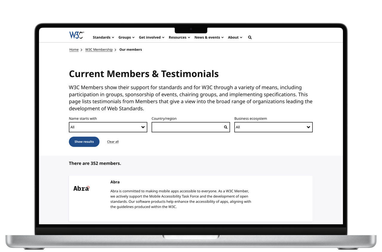 Screenshot of the Our members page on the W3C website, listing Abra as one of the 352 members